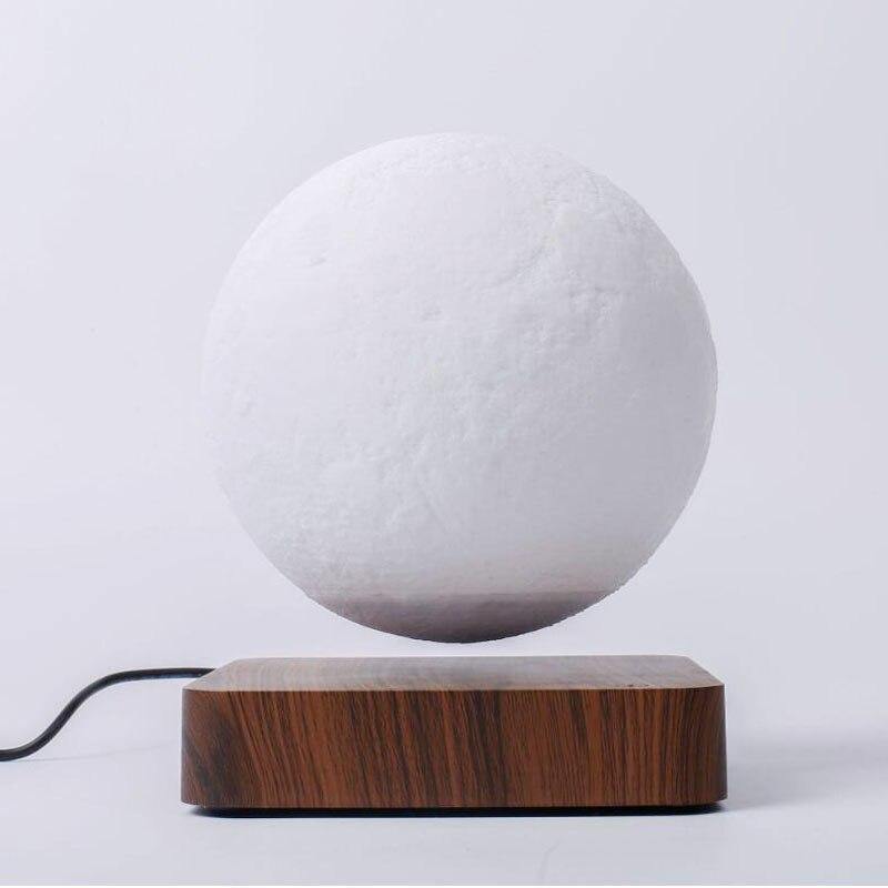 Levitating moon lamp desk decor close up