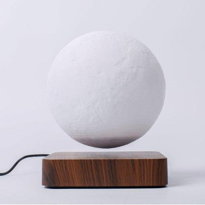 Levitating moon lamp desk decor close up